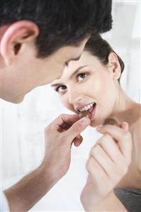 couple eating chocolates