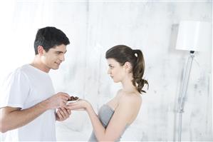 couple eating chocolates