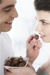 couple eating chocolates