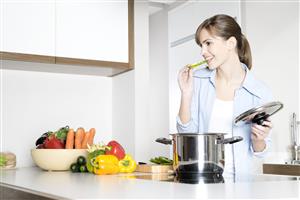 woman eating pepper