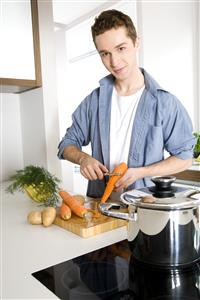 man peeling carrots