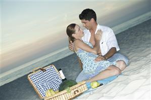 couple during picnic on beach