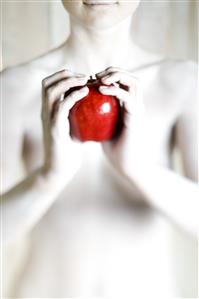 Woman holding apple