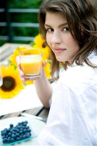 Woman with glass of juice