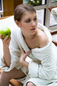 Woman eating apple