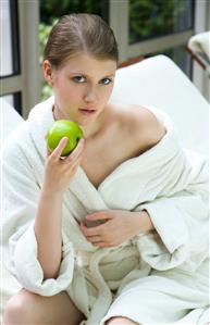 Woman eating apple