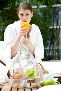 Woman drinking orange juice