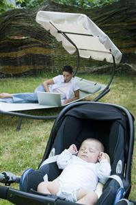 Mother and baby spending time in the garden