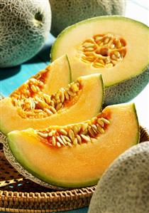 Cantaloupe melons, whole and sliced