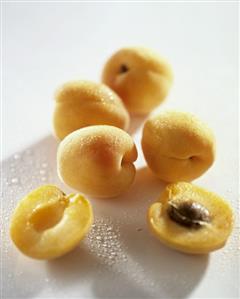 Apricots, one halved