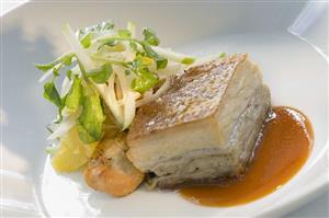 Pork neck with scallop and grapefruit salad