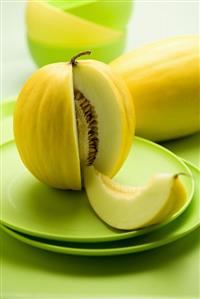 Honeydew melon with a slice removed