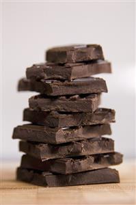 Pieces of dark chocolate in a pile