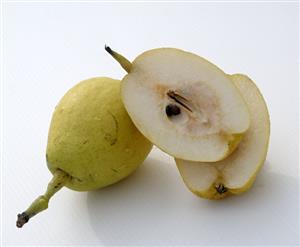 Whole and halved Nashi pears