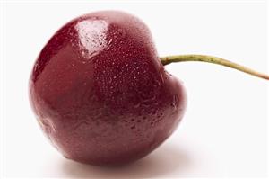 A cherry covered in condensation