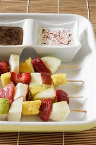 Fruit kebabs with chocolate dip and yoghurt dip