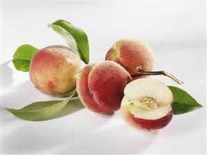 Four white peaches