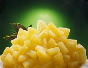 Pineapple chunks with pineapple leaves