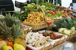 Market stall with fruit, vegetables, mushrooms and herbs