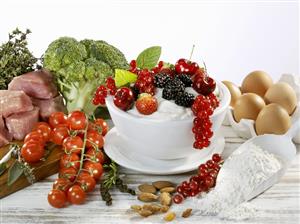 Still life with berries, vegetables, meat, flour, eggs