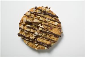 Christmas biscuit with nuts and chocolate drizzle