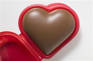 Chocolate heart in red plastic box