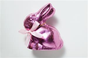 Chocolate bunny in pink foil