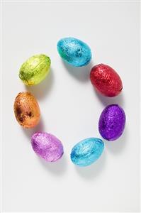 Small chocolate eggs wrapped in foil