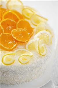 Orange and lemon gateau with grated coconut