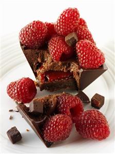 Small chocolate cake with raspberries