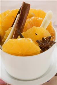 Orange slices with star anise, lemon grass & cinnamon sticks