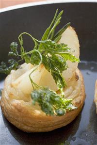 Savoury pear patty with deep-fried parsley