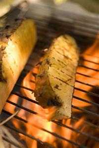 Pineapple on barbecue grill rack