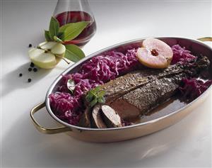 Saddle of venison with red cabbage and apples