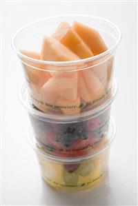 Fresh fruit in three plastic tubs