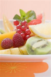 Plate of exotic fruit and berries