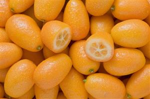 Many kumquats, one halved