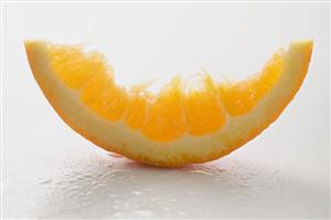 Wedge of orange, partly eaten