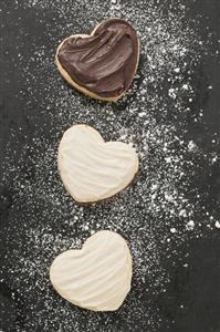 Three heart-shaped Christmas biscuits