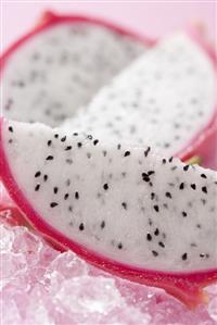 Wedges of pitahaya on crushed ice