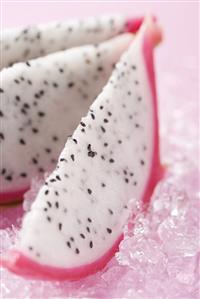 Wedges of pitahaya on crushed ice