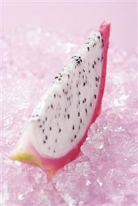 Wedge of pitahaya on crushed ice