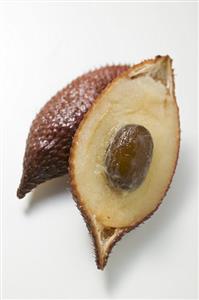 Salak fruit, halved