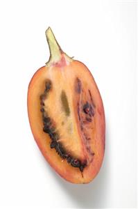 A wedge of tamarillo (overhead view)