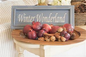 Christmas decoration: pomegranates, cones and sign