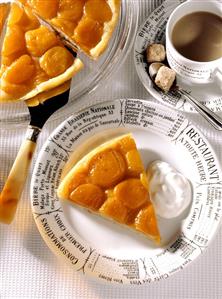 Piece of apricot tart with cream