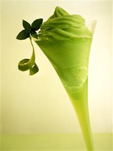 Lime mint sherbet in a champagne flute