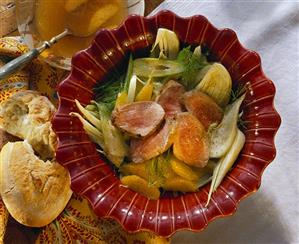 A Bowl of Fennel Salad with Fruit and Pork