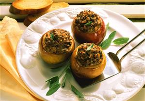 Three baked Apples with Liver and Herb Stuffing and fresh Sage