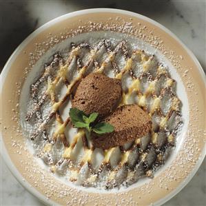 Chocolate mousse on a pastry rack